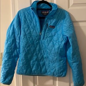 Woman’s Patagonia micro-puff